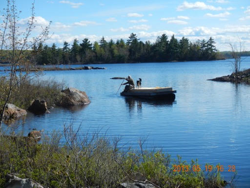 Tom and Huck paddle the dock to the mooring Tom and Huck paddle the dock to the mooring